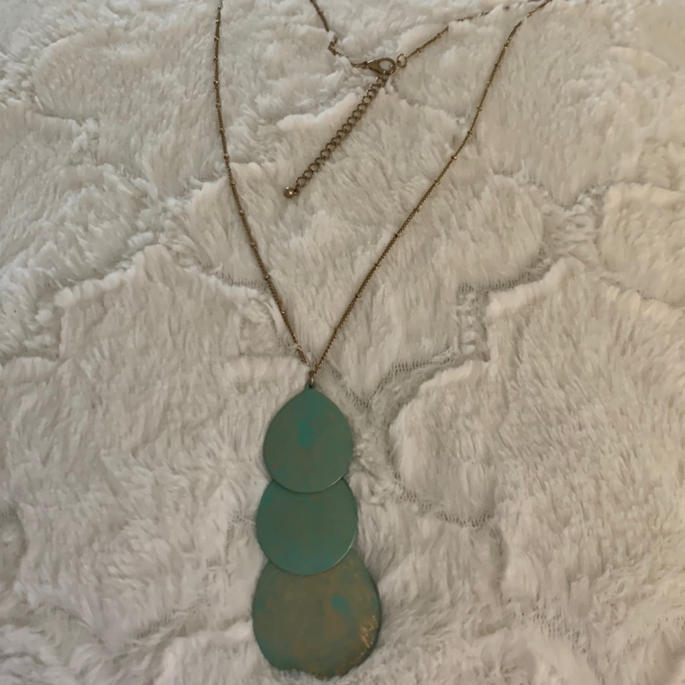 Blue and gold‎ metal pendant with gold tone chain.Fun piece